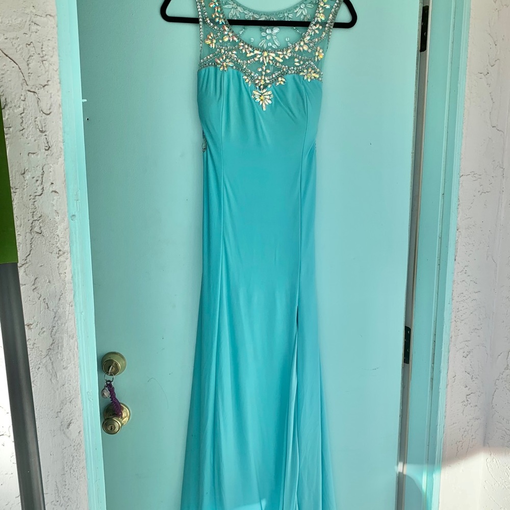 The most stunning light turquoise/baby blue gown.
